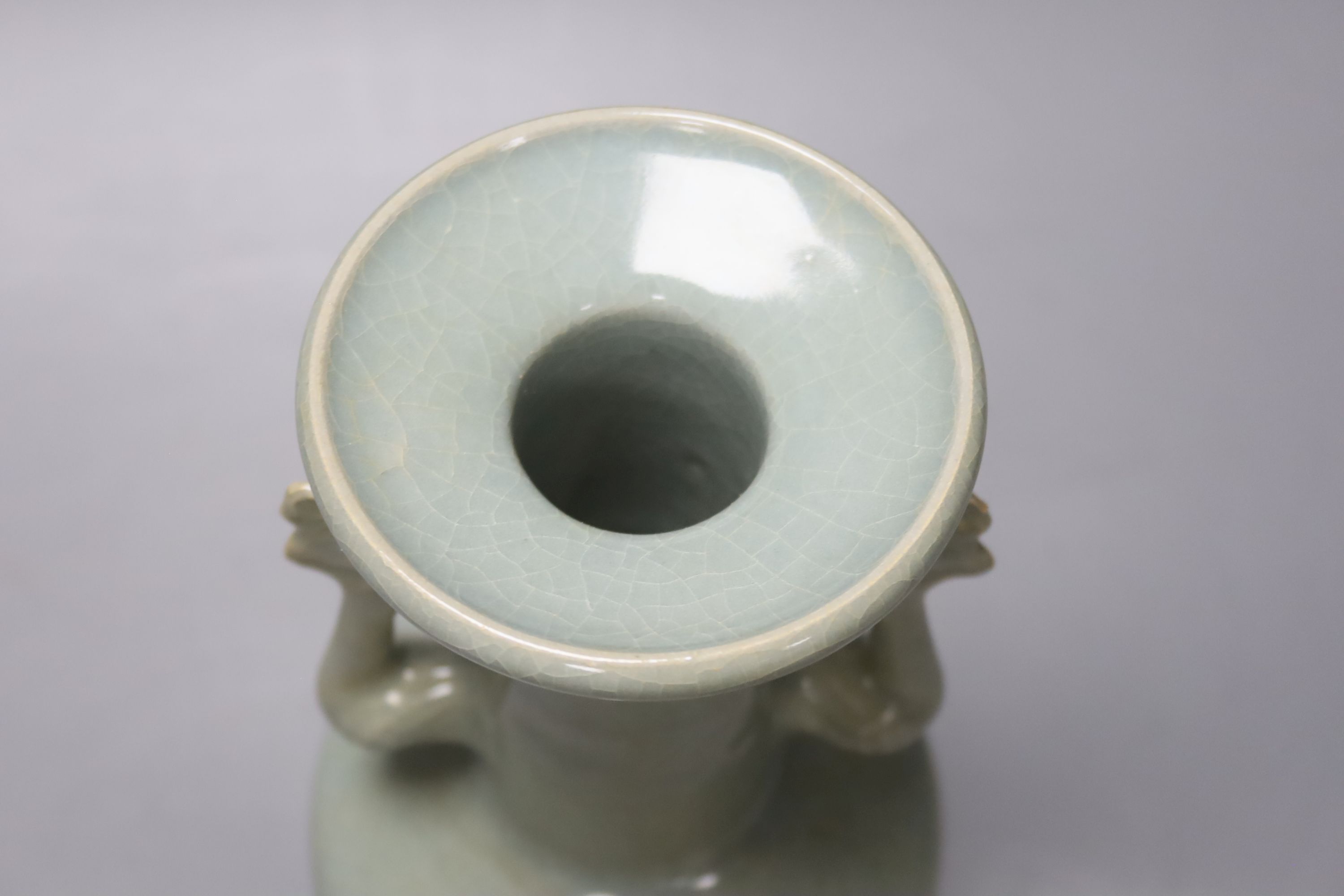 A celadon crackle-glaze twin handled vase, height 25cm